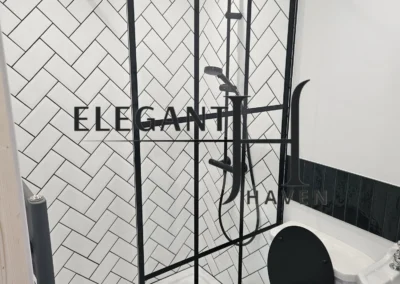 Affordable bathroom renovation featuring modern fixtures in North London.