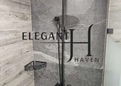 Compact bathroom renovation featuring sleek tiles and fixtures in South London.