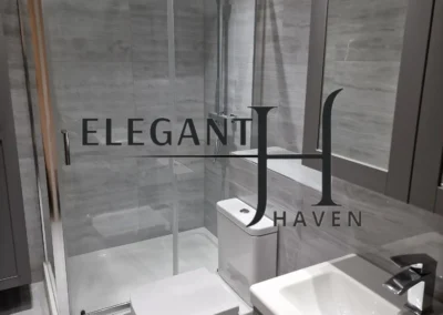 Contemporary bathroom design with bespoke lighting and finishes